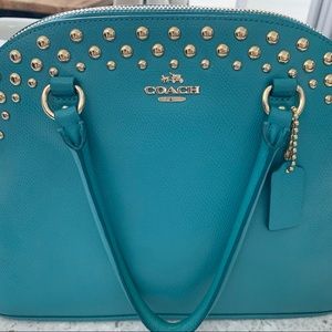 Coach purse in teal. Excellent condition.